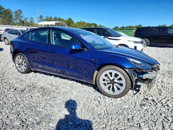 2023 TESLA MODEL 3 — Passenger 3/4