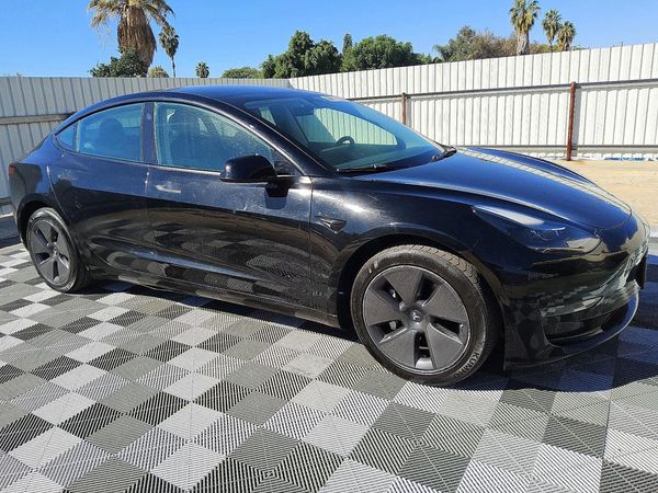 2023 TESLA MODEL 3 — Passenger 3/4