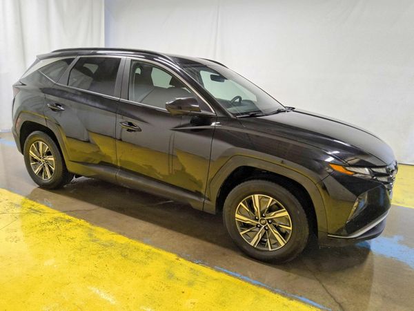 2024 HYUNDAI TUCSON Blue — Passenger 3/4