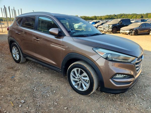 2016 HYUNDAI TUCSON — Passenger 3/4