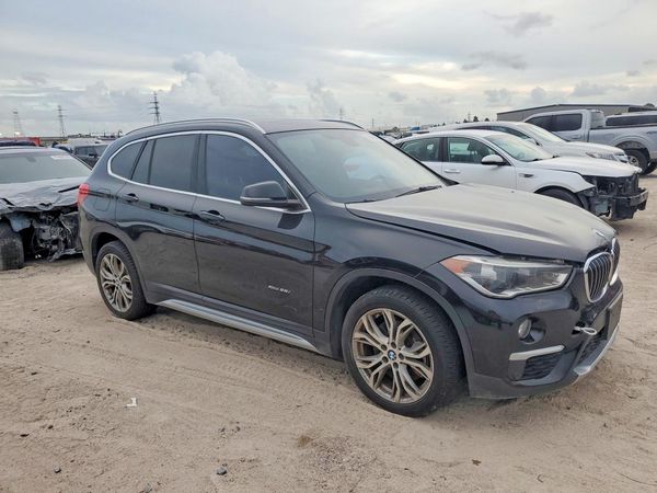 2017 BMW X1 xDrive28iBr — Passenger 3/4