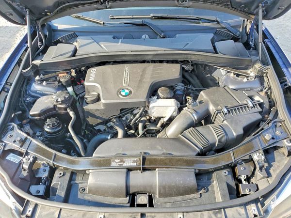 2014 BMW X1 xDrive28i — Engine bay