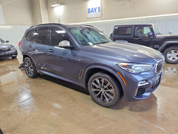 2020 BMW X5 M50i — Passenger 3/4