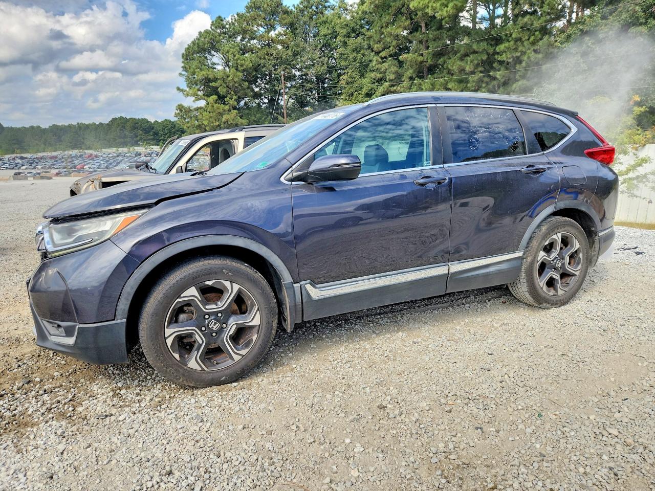 2017 HONDA CRV Touring — Front 3/4