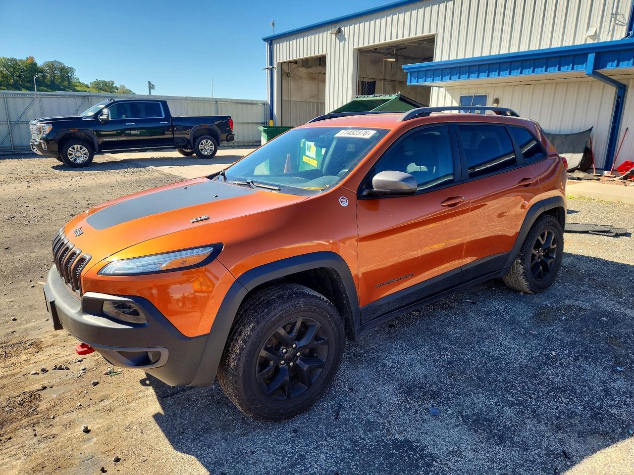 2016 JEEP CHEROKEE TRAILHAWK 4X4 — Front 3/4