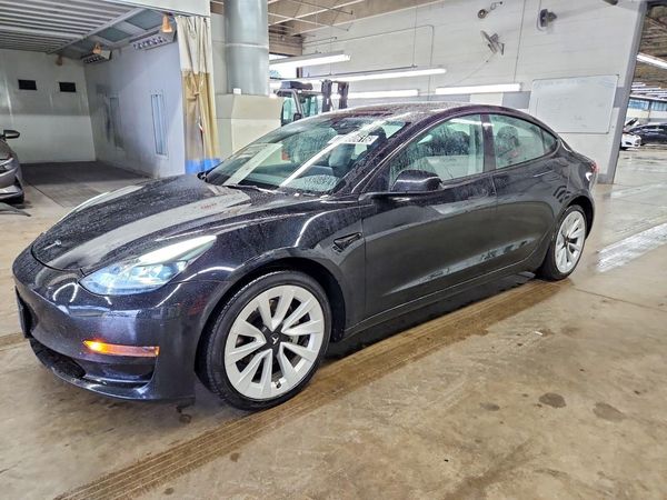 2023 TESLA MODEL 3 — Front 3/4