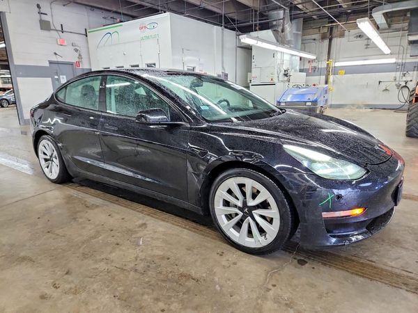 2023 TESLA MODEL 3 — Passenger 3/4