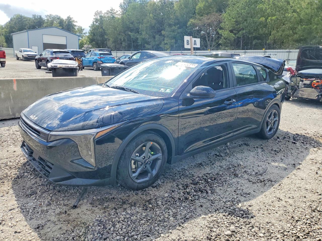 2026 KIA K4 LX, LXS — Front 3/4