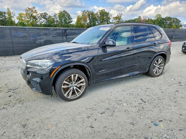 2014 BMW X5 xDrive50i — Front 3/4