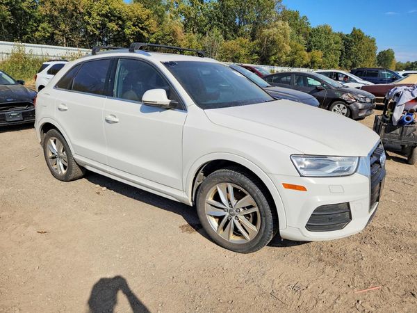 2016 AUDI Q3 quattro Premium Plus — Passenger 3/4