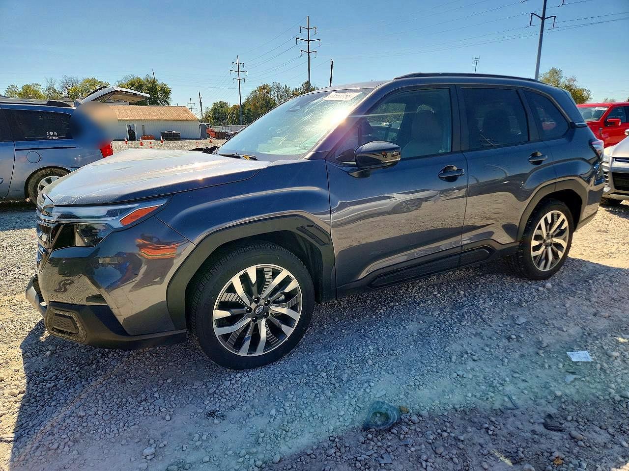 2025 SUBARU FORESTER Touring — Front 3/4