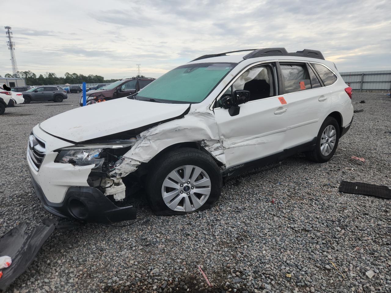 2019 SUBARU OUTBACK Premium+ES — Front 3/4
