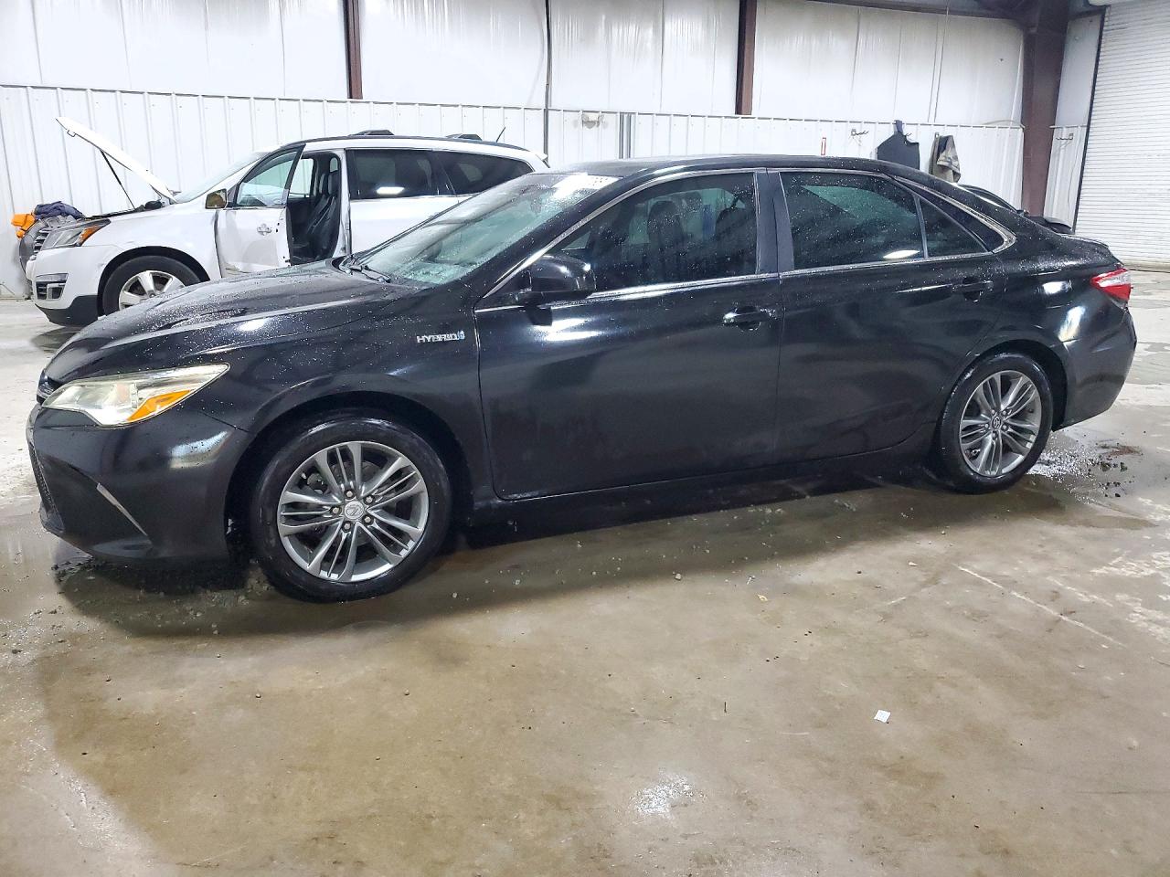 2016 TOYOTA CAMRY SOLA Hybrid — Front 3/4