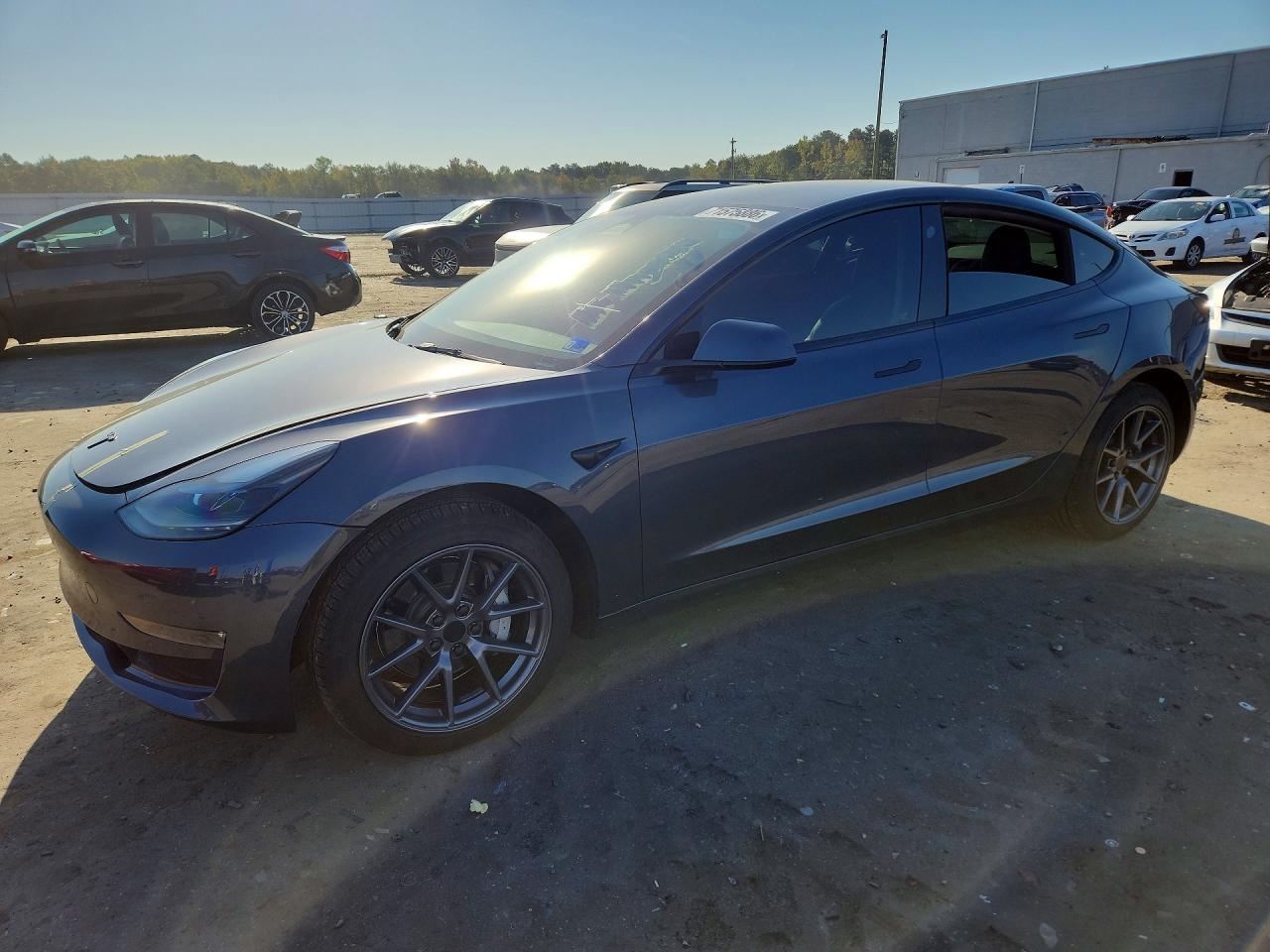 2022 TESLA MODEL 3 — Front 3/4