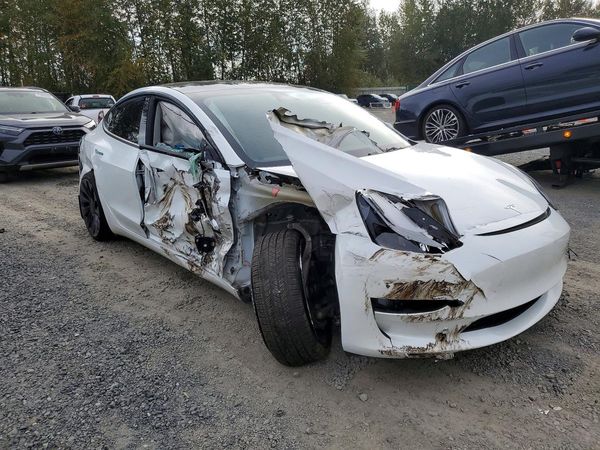2023 TESLA MODEL 3 — Passenger 3/4