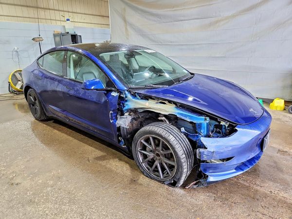2022 TESLA MODEL 3 — Passenger 3/4