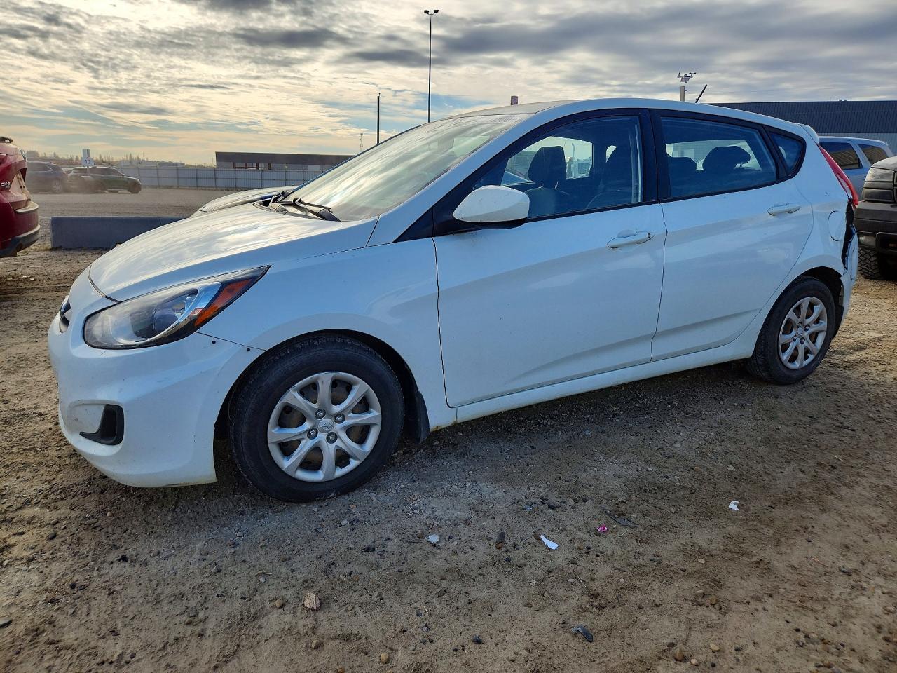 2014 HYUNDAI ACCENT 5DR GS / 4DR GLS — Front 3/4