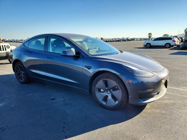 2023 TESLA MODEL 3 — Passenger 3/4