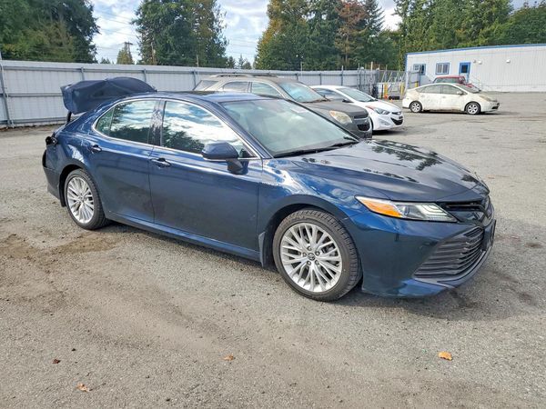 2019 TOYOTA CAMRY SOLA SE/XLE Hybrid — Passenger 3/4