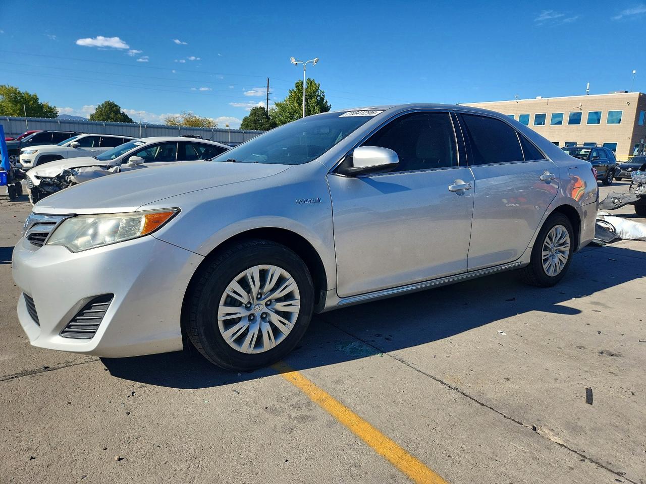 2013 TOYOTA CAMRY SOLA Hybrid — Front 3/4