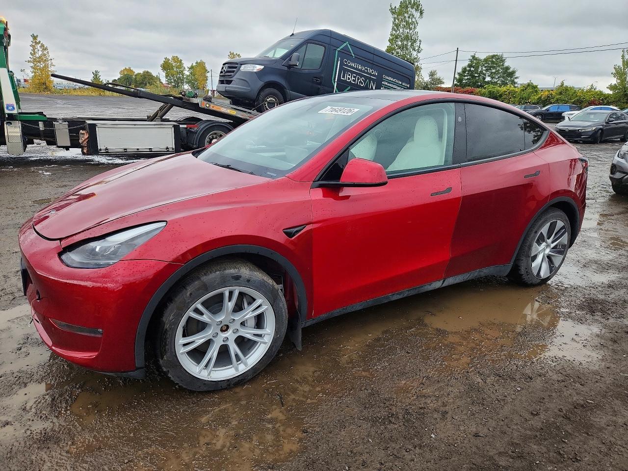 2024 TESLA MODEL Y — Front 3/4