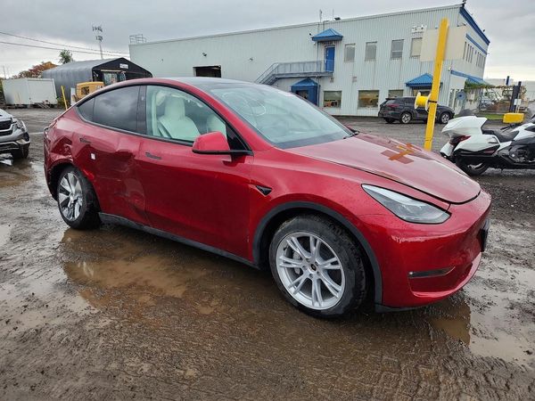2024 TESLA MODEL Y — Passenger 3/4