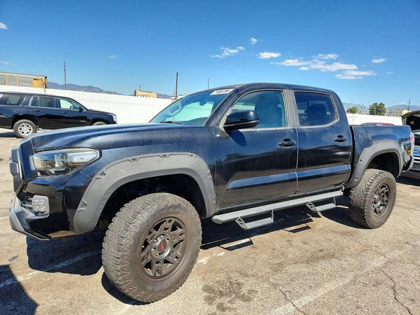 2019 TOYOTA TACOMA SR5 — Front 3/4