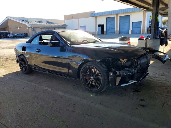 2024 BMW M4 xDrive — Passenger 3/4