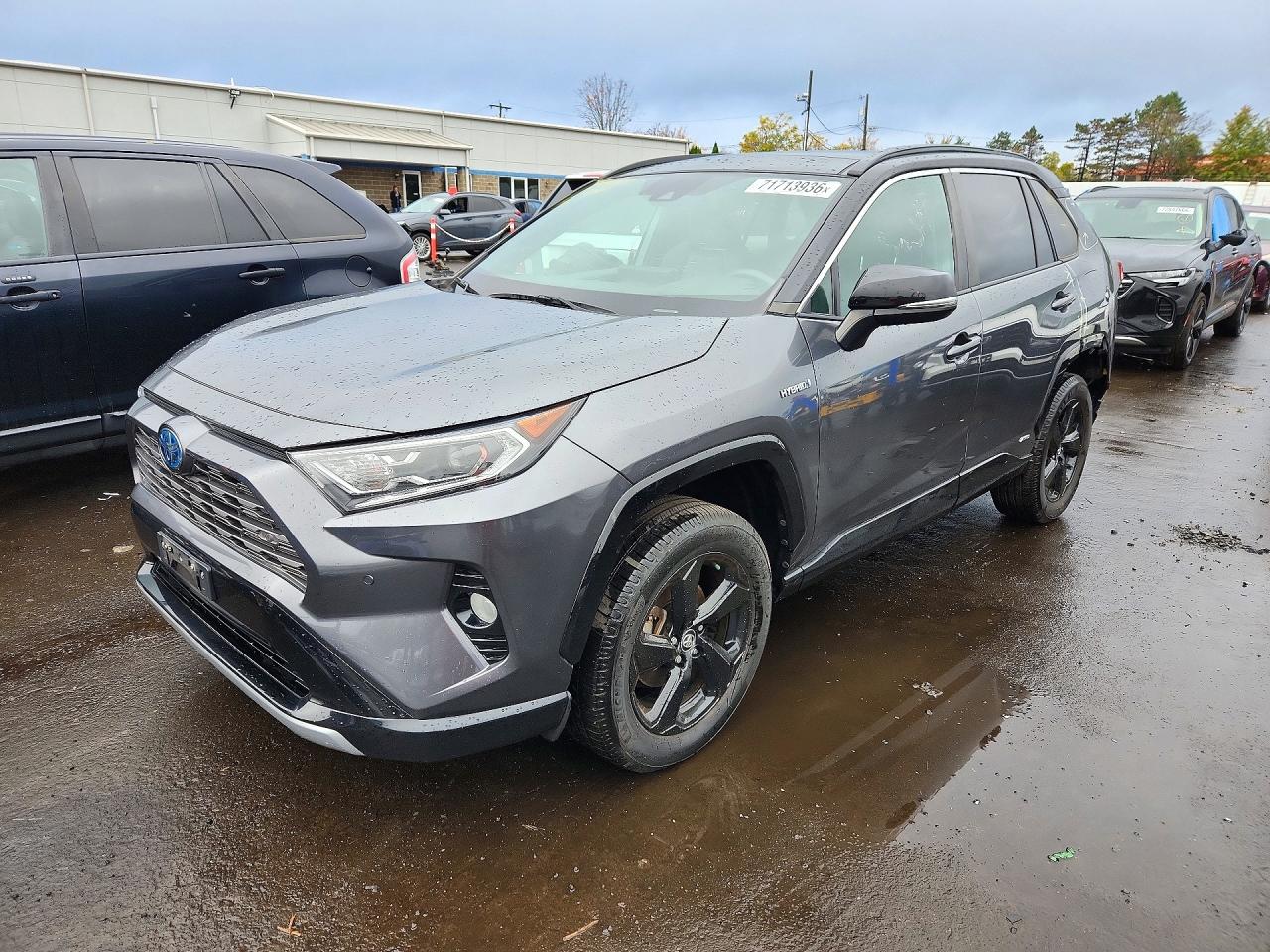 2021 TOYOTA RAV4 XSE HV — Front 3/4