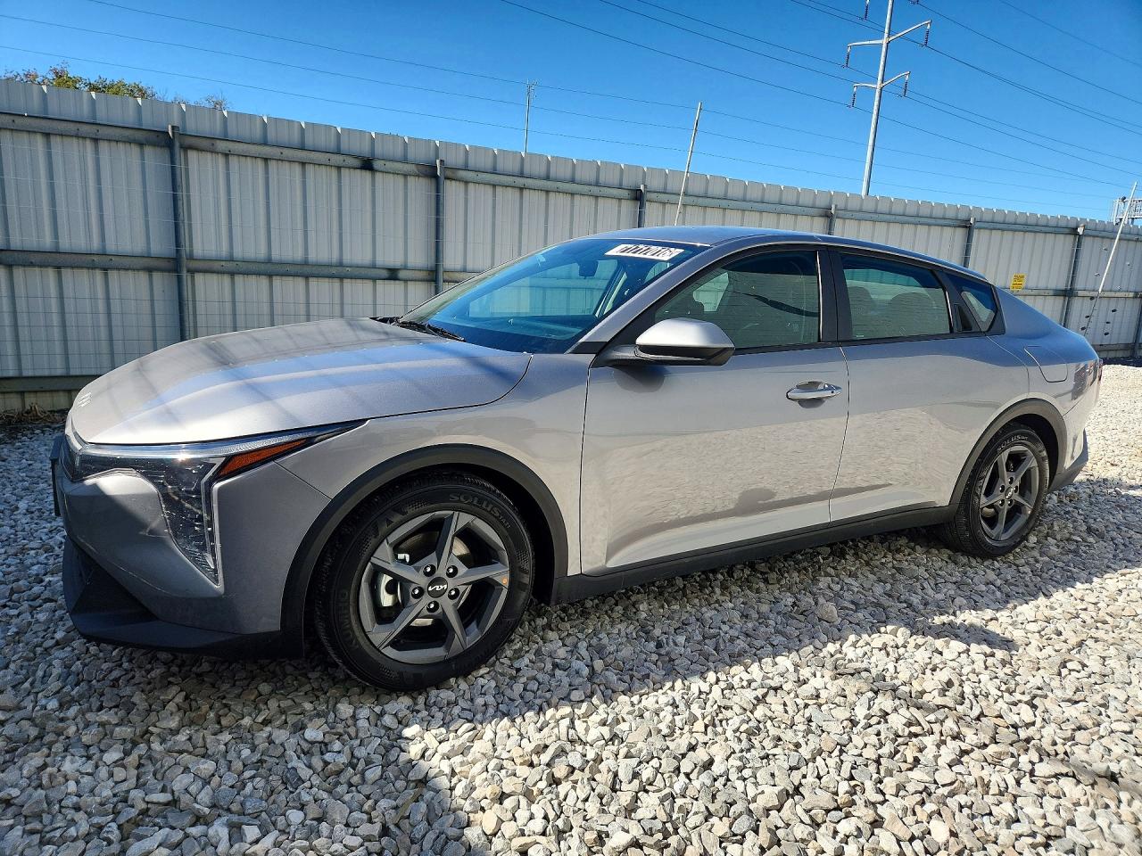 2026 KIA K4 LX, LXS — Front 3/4