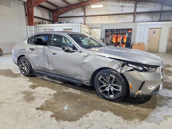 2027 BMW 530 xDrive — Passenger 3/4