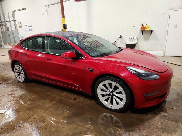 2023 TESLA MODEL 3 — Passenger 3/4