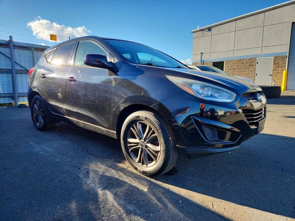2014 HYUNDAI TUCSON GL (Middle-low Level) — Passenger 3/4