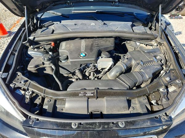 2014 BMW X1 sDrive 28i — Engine bay