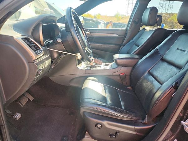 2016 JEEP GRAND CHEROKEE Summit — DENT