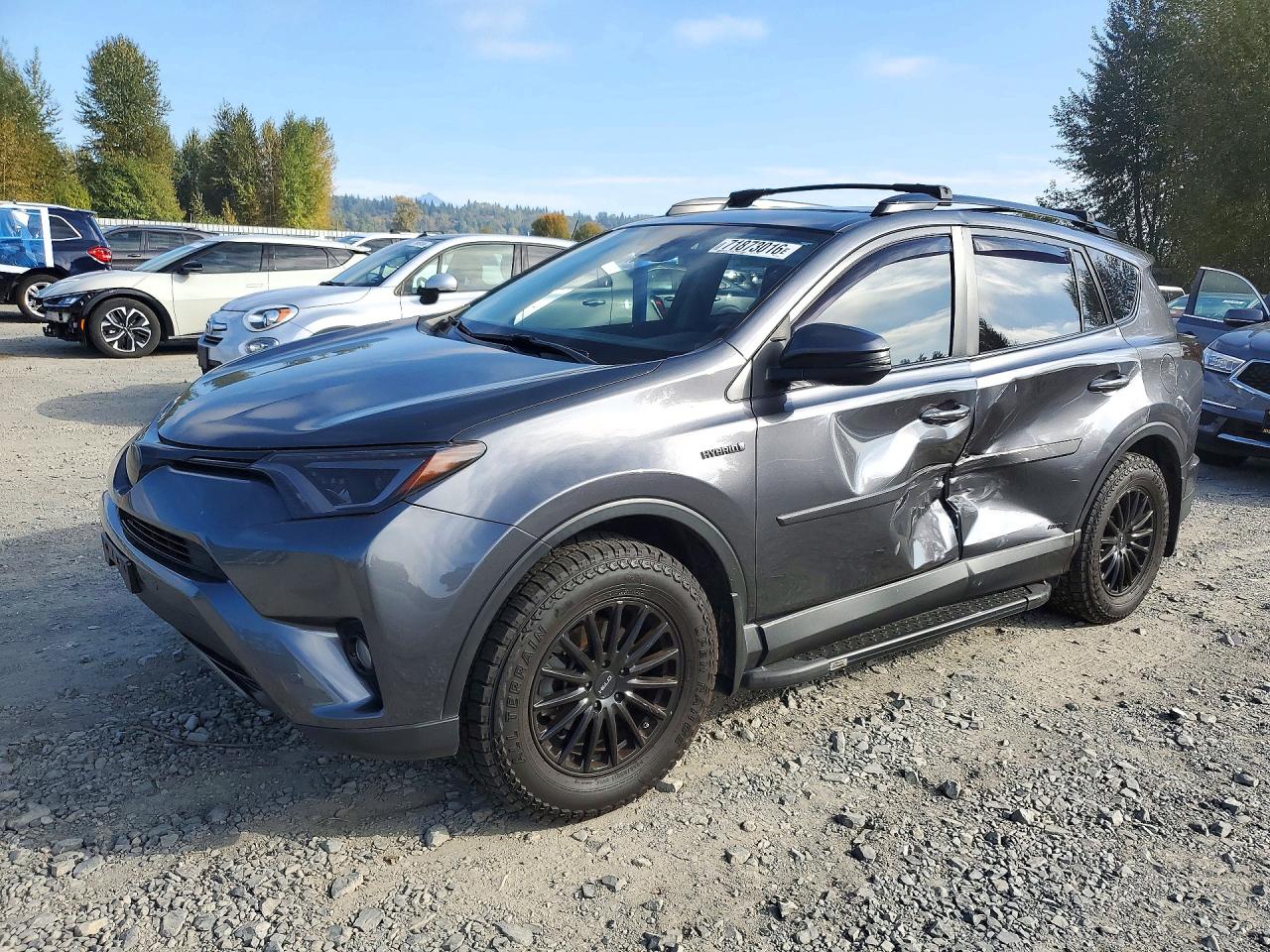 2017 TOYOTA RAV4 Ltd Hybrid — Front 3/4