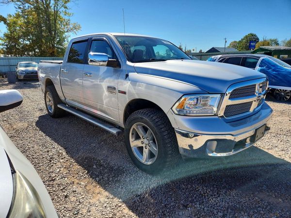 2014 RAM 1500 Longhorn — Passenger 3/4
