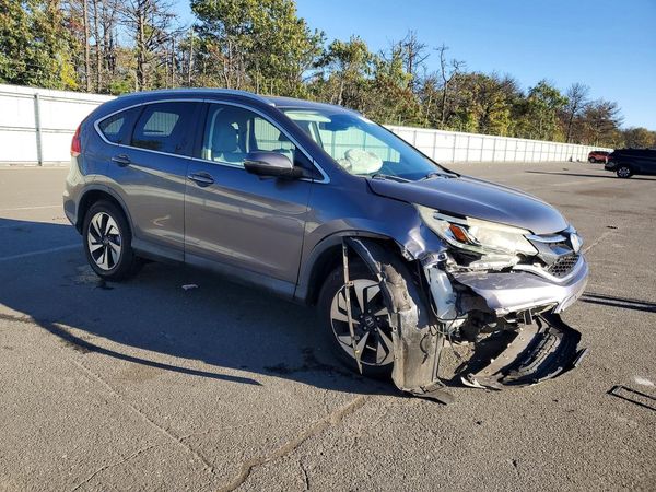2016 HONDA CRV Touring — Passenger 3/4