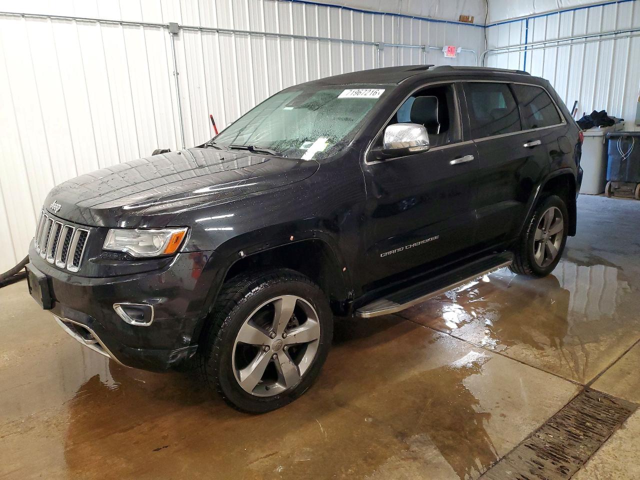 2014 JEEP CHEROKEE Overland — Front 3/4