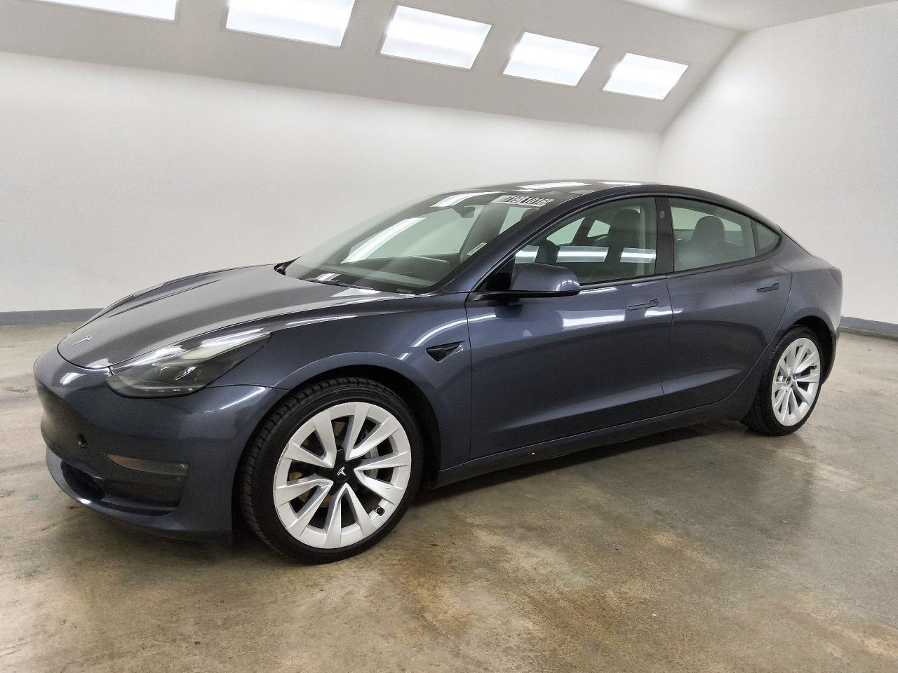 2022 TESLA MODEL 3 — Front 3/4