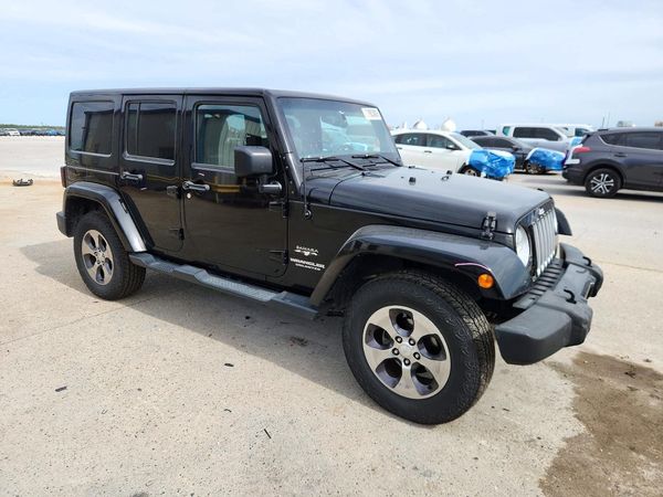 2016 JEEP WRANGLER UNLIMITED Sahara — Passenger 3/4