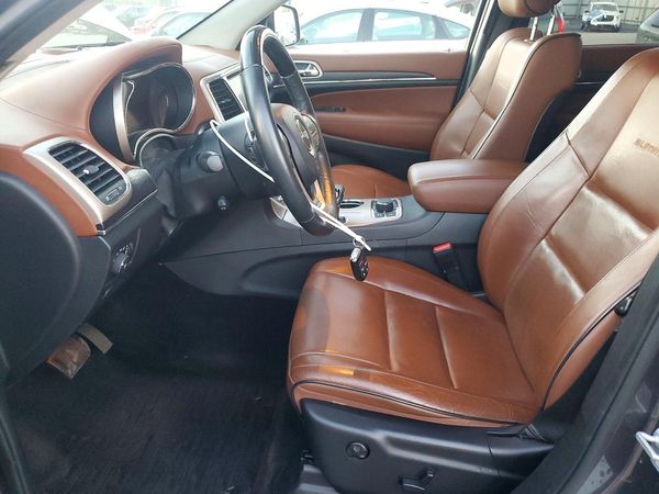 2015 JEEP GRAND CHEROKEE Summit — DENT