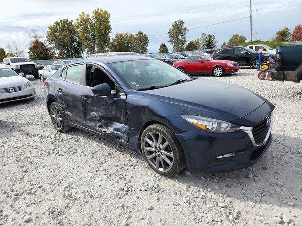 2018 MAZDA 3 Touring — Passenger 3/4