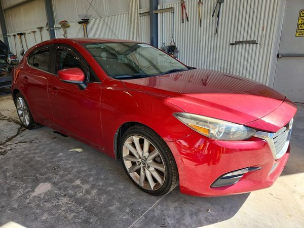 2017 MAZDA 3 Touring — Passenger 3/4