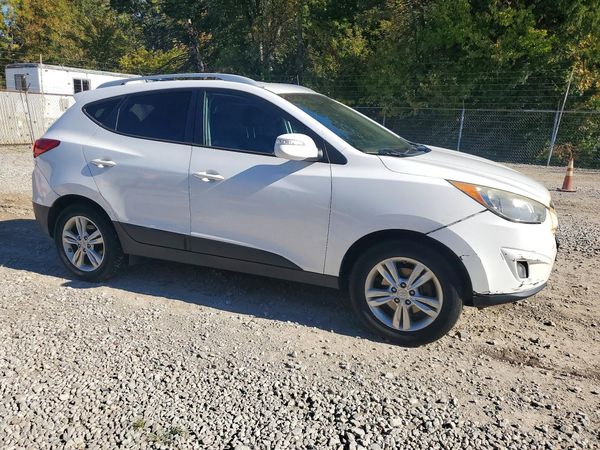 2013 HYUNDAI TUCSON — Passenger 3/4