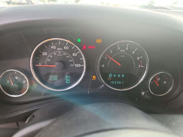 2013 JEEP WRANGLER Sahara — ODOM