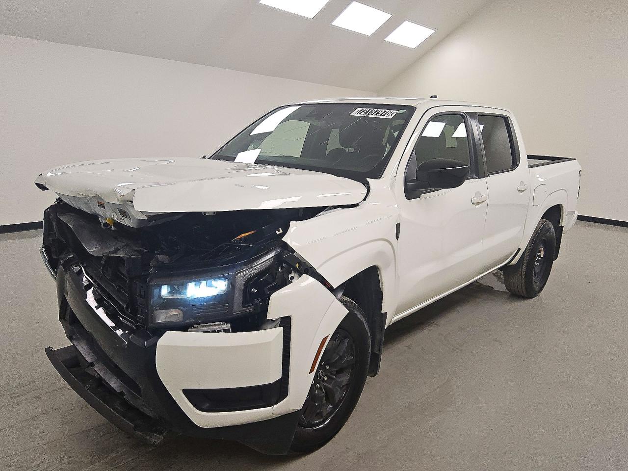 2026 NISSAN FRONTIER — Front 3/4