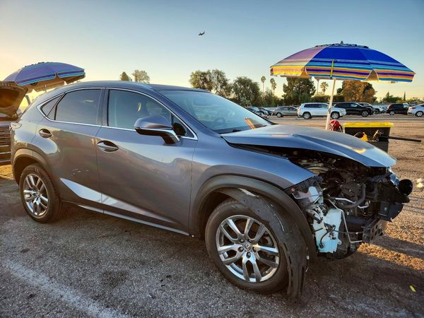 2015 LEXUS NX 200t Luxury — Passenger 3/4