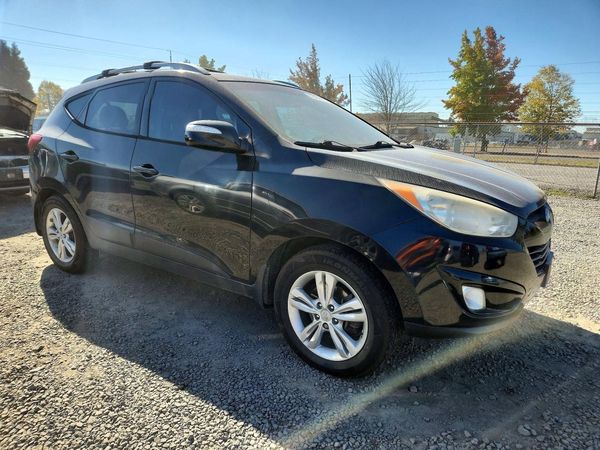 2013 HYUNDAI TUCSON — Passenger 3/4