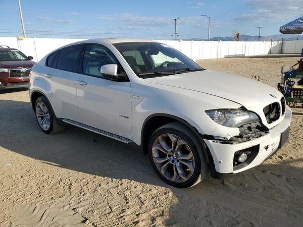 2012 BMW X6 xDrive50i — Passenger 3/4